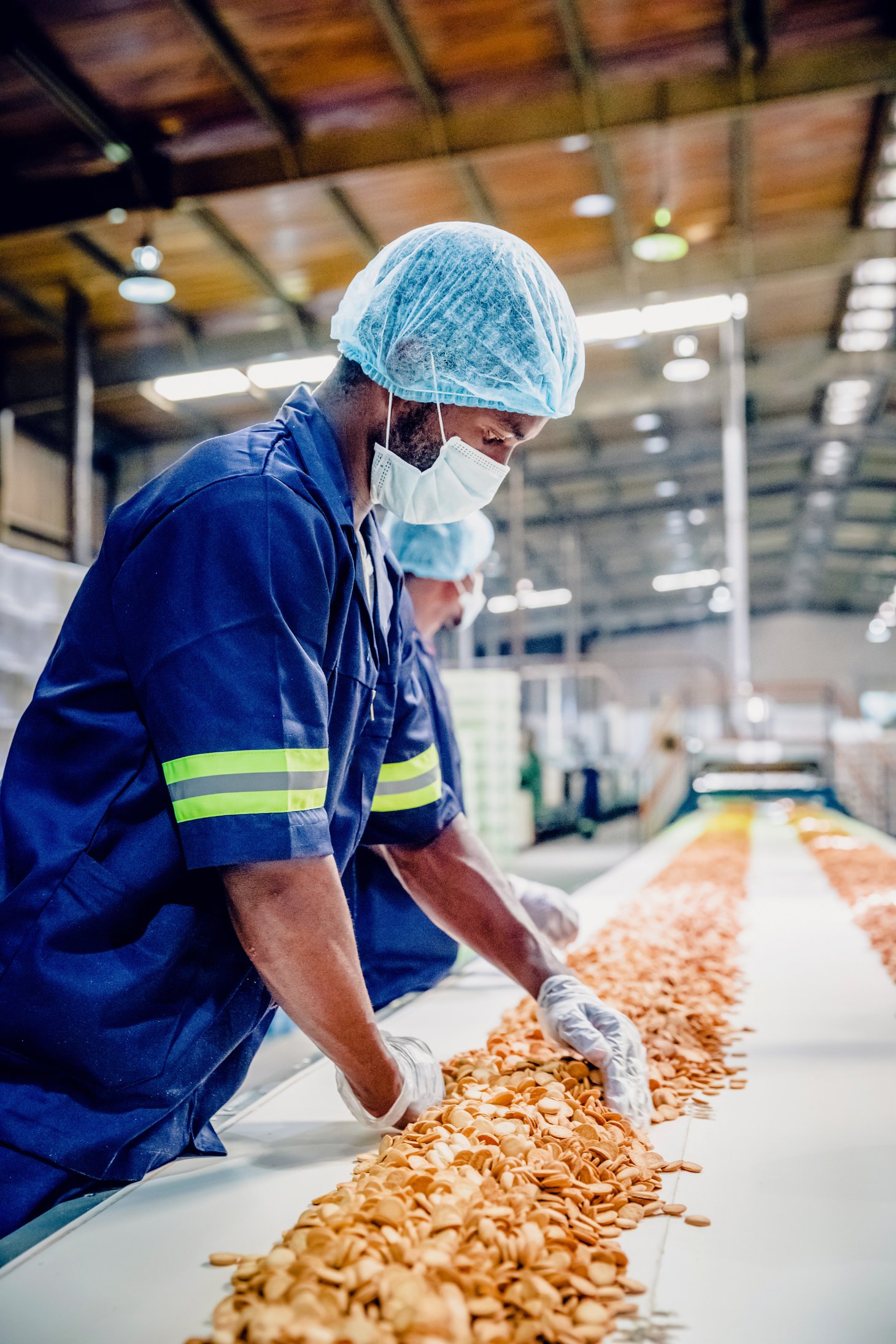 Production Line Workers at a Food Processing Plant